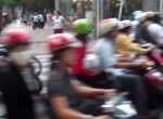 CROSSING ROAD IN HO CHI MINH VIETNAM