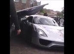 Sign falls on a Porsche 918
