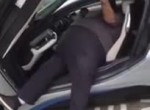 Fat man gets out of BMW i8